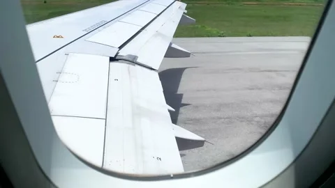 From window view, Control Speeding plane and take off from run way Stock Footage 218340026