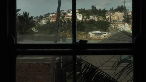 Window view of Coogee life saving club and surrounding buildings slomo Video stock 272188103