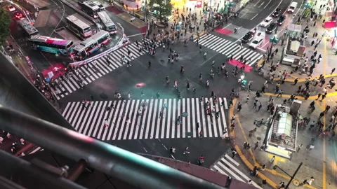 Window view of Crowd people pedestrians walking cross zebra crosswalk in Shibuya Stock-Footage 187738997