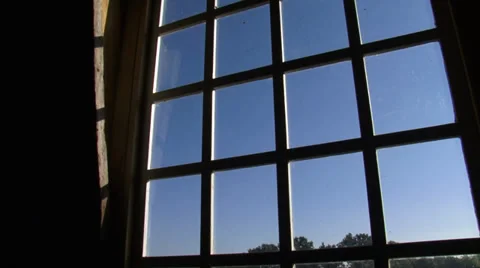 Window view from a Dutch windmill + turning wicks in blue sky Stock Footage 34639144