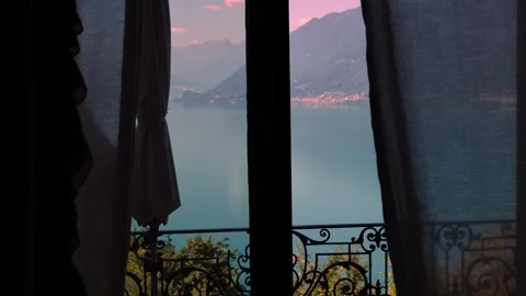 Window View From Giessbach over Lake Brienz with Mountain Vídeos de archivo 264576334