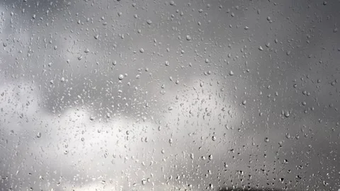 Window View of Gray Clouds After the Storm with Slowly Dripping Raindrops Stock Footage 287046796