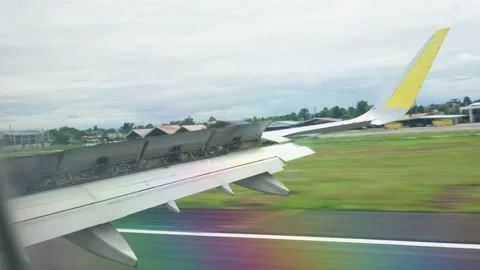 Window view of inside flying airplane taking off Stock Footage 325173373