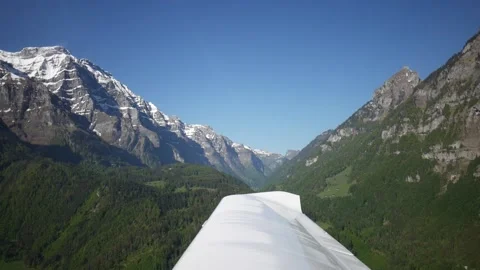 Window view from inside a propeller plane. Beautiful, green, rural, Stock Footage 132751641