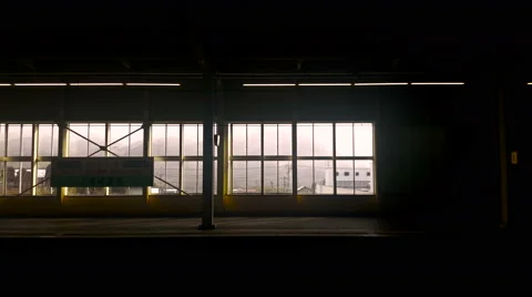 Window view japan train in Japan leaving from staion Stock Footage 68024429