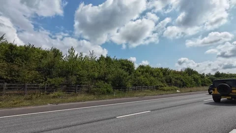 Window View of Motorways and Traffic During Car Travel From Luton to Canterbury Stock Footage 314465229
