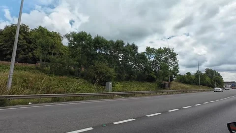 Window View of Motorways and Traffic During Car Travel From Luton to Canterbury Stock Footage 314467687