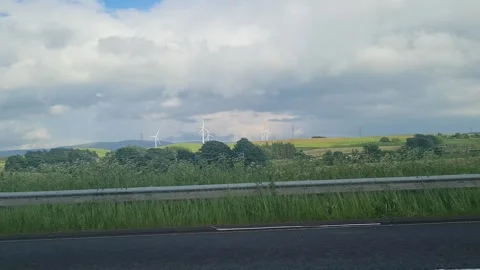 Window View of Motorways and Traffic During Car Travel From Scotland to England Stock Footage 314469586