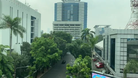 Window View of a Moving MRT Train Offering City View of Jakarta During Pandemic Stock Footage 156662154