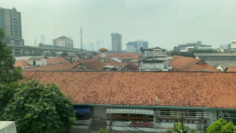 Window View of a Moving MRT Train Showing Intersection with Busway Line Stock Footage 156662159