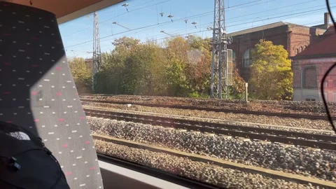 Window view from a moving train over the buildings in Brussels, Belgium Stock Footage 225924140