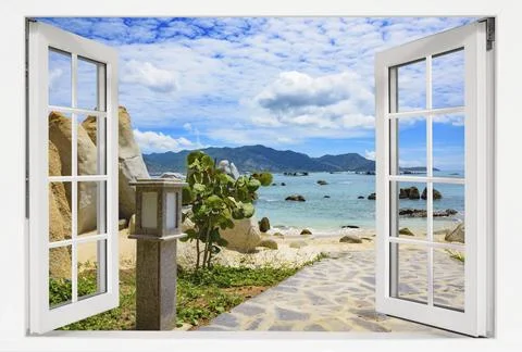 Window with a view of the ocean and a beach. The window is open. There is a Stock Photos