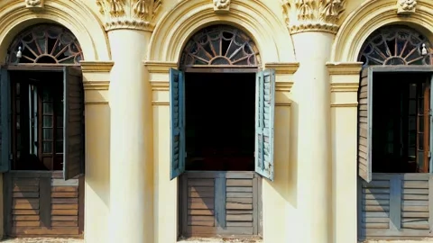 Window view of an old heritage abandoned building from outside Stock Footage 247930432