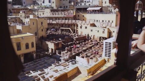 Window View To People Working In The Chouara Tannery Stock Footage 146103597