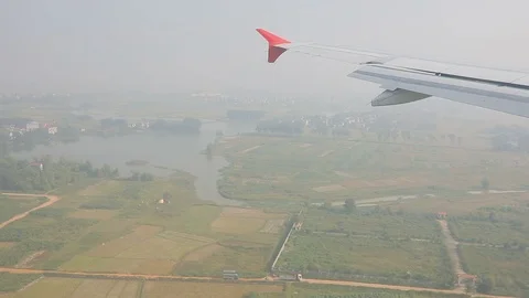 Window view of plane approaching for landing to airport Video stock 88141572