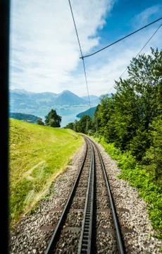 Window View: railway track down Rigi Kulm Station, Lucerne, Switzerland. Stock Photos