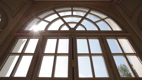 Window view to rural landscape outside with sun beam in glass tracking pan Stock Footage 70673423