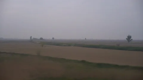 Window View from Train, Car or Bus, in 4K, No Color Correction Stock Footage 89253600