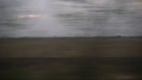 Window View from Train, Car or Bus, in 4K, No Color Correction Stock Footage 89293569