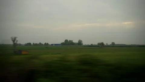 Window View from Train, Car or Bus, in 4K, No Color Correction Stock Footage 89564826