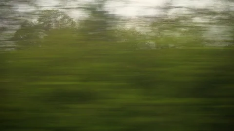 Window View from Train, Car or Bus, in 4K, No Color Correction Stock Footage 89567104