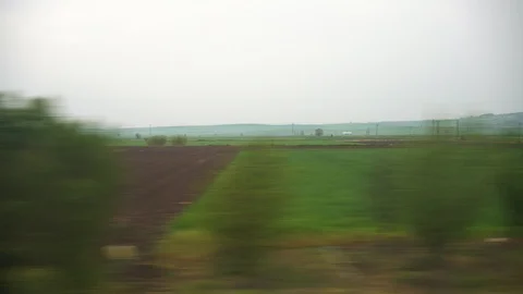 Window View from Train, Car or Bus, in 4K, No Color Correction Stockbeeldmateriaal 89595840