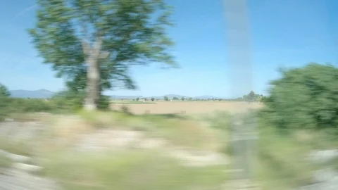 Window View from Train, Car or Bus, in 4K, No Color Correction Stockbeeldmateriaal 89821006