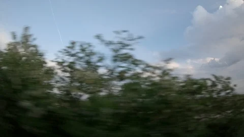 Window View from Train, Car or Bus, in 4K, No Color Correction Stock Footage 89821599