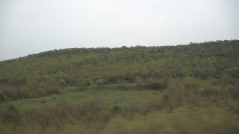 Window View from Train, Car or Bus, in 4K, No Color Correction Stock Footage 90065038