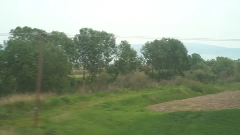 Window View from Train, Car or Bus, in 4K, No Color Correction Видео 90065560