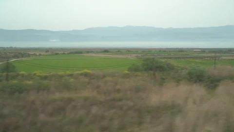 Window View from Train, Car or Bus, in 4K, No Color Correction Stockbeeldmateriaal 90065643