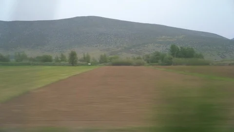Window View from Train, Car or Bus, in 4K, No Color Correction Stockbeeldmateriaal 90066804