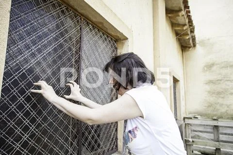 Window violent woman screaming, aggression Stock Photos