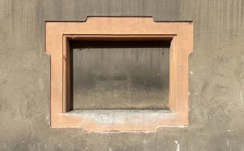 Window on the wall of the building. Stock Photos