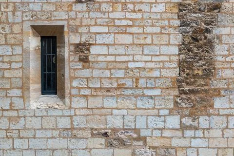 A window in the wall of the convent of St. Agnes of Bohemia in Prague Stock Photos