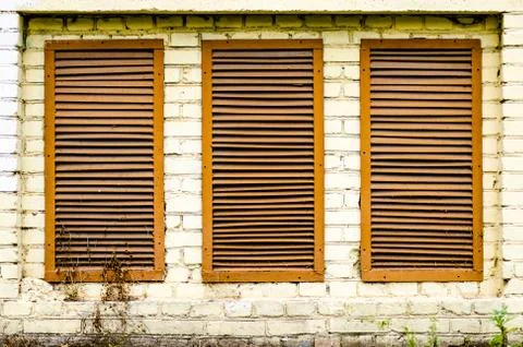 The window in the wall from old bricks Stock Photos