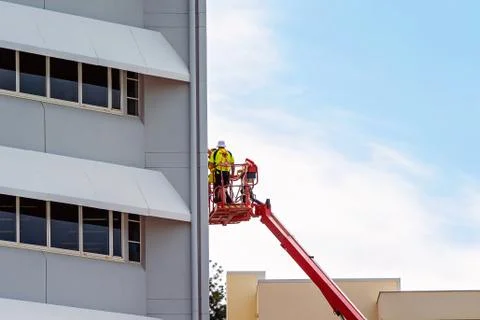 Window Washers Outside High Rise Cuilding Stock Photos