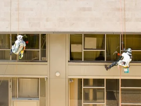 Window washers Stock Photos