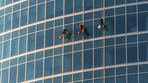 The window washers on the skyscrapers at work, time lapse Video stock 108436208