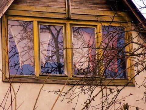 Window in which life is reflected Stock Photos