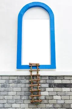 Window with white copyspace and rope ladder Stock Photos