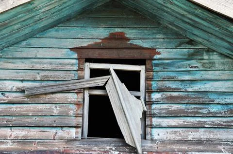 Window without glass. The window of an old wooden house without glass. Stock Photos