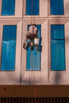 Window Worker cleaning windows Stock Photos
