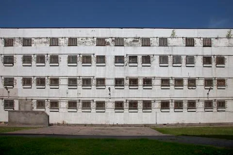 The windows of an abandoned prison Stock Photos