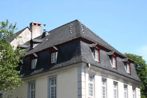 Windows and dormers Stock Photos