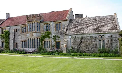 Windows and old stone walling in an English Manor House Stock Photos