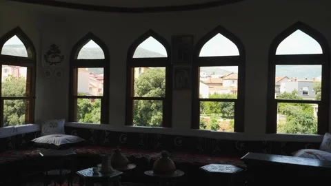 Windows and Sofas in a Traditional Ottoman House, Interior view, Tilt Down 動画素材 230450224