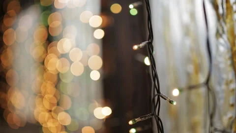 The Windows are decorated with twinkling lights, garlands in the new year's eve Stock Footage 117418342