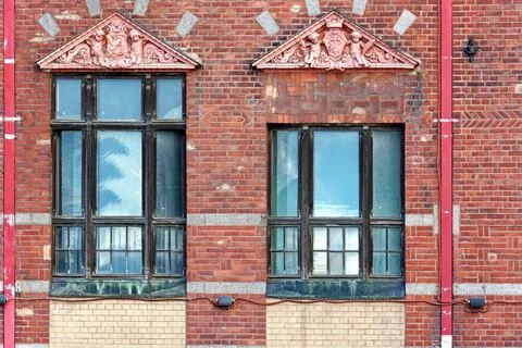 Windows with bas-relief. Stock Photos