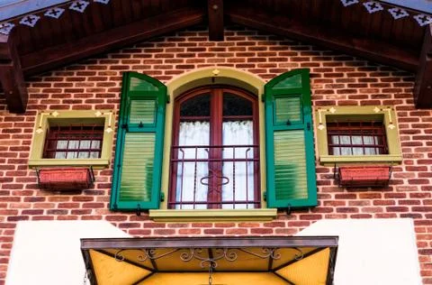 Windows of brick house Stock Photos